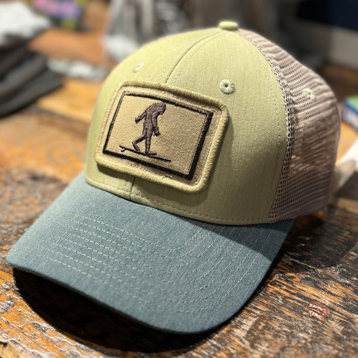 Surfing Sasquatch Structured Trucker Hat, Dismal Swamp Green